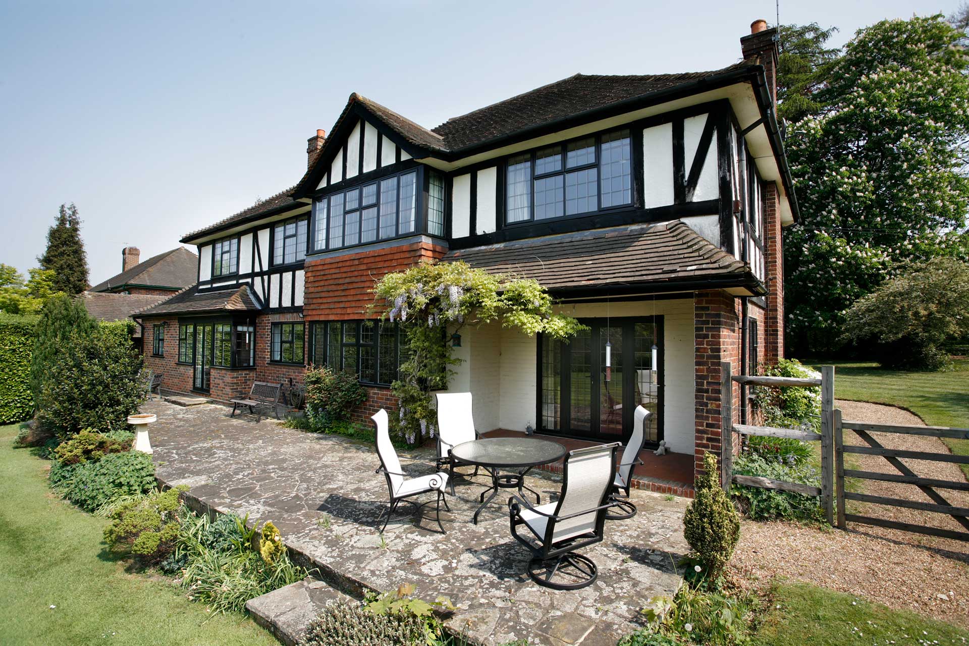 traditional victorian home with modern aluminium French doors and windows