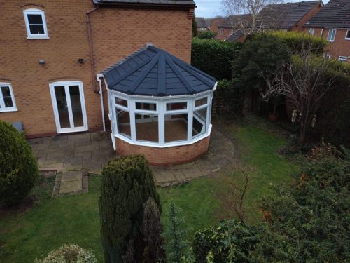 A conservatory with a guardian warm roof